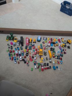 Lots of toy vehicles - cars, truck , construction, busses