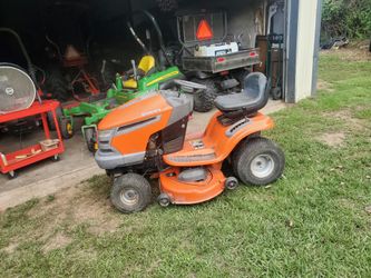 2 riding mowers, hasquvana  runs needs battery, big john  deere l130,has good body, deck and tires no motor..450$ For both
