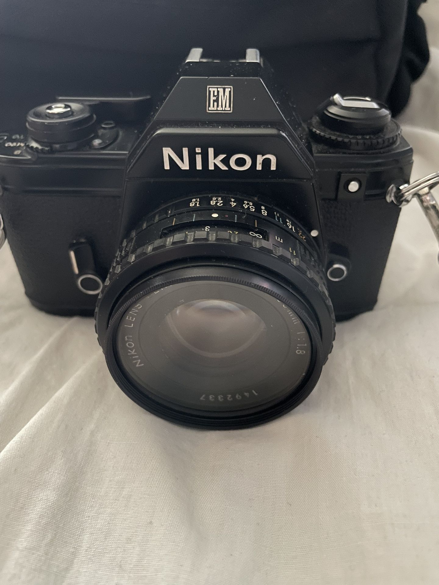Nikon EM Film Camera With Lens And Filter