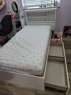 Twin bed with Drawers and Bookcase Headboard
