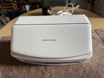 The Fujitsu iX1500 is a high-quality double-sided color scanner that offers excellent scanning capabilities. With a maximum resolution of 600 x 600 DP