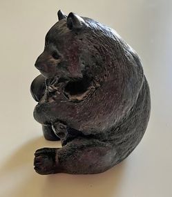 Black Bear Figurine Holding Branch – Detailed Rustic Woodland Cabin Decor