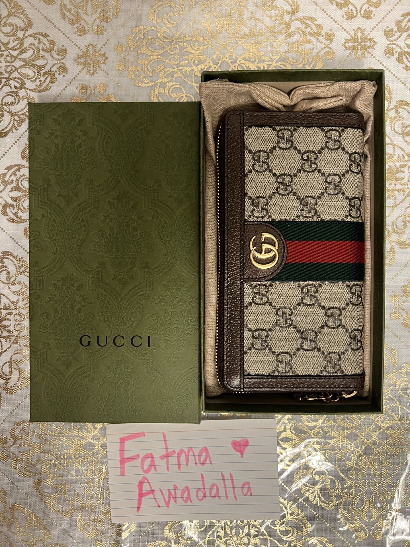 Ophidia GG zip around wallet.