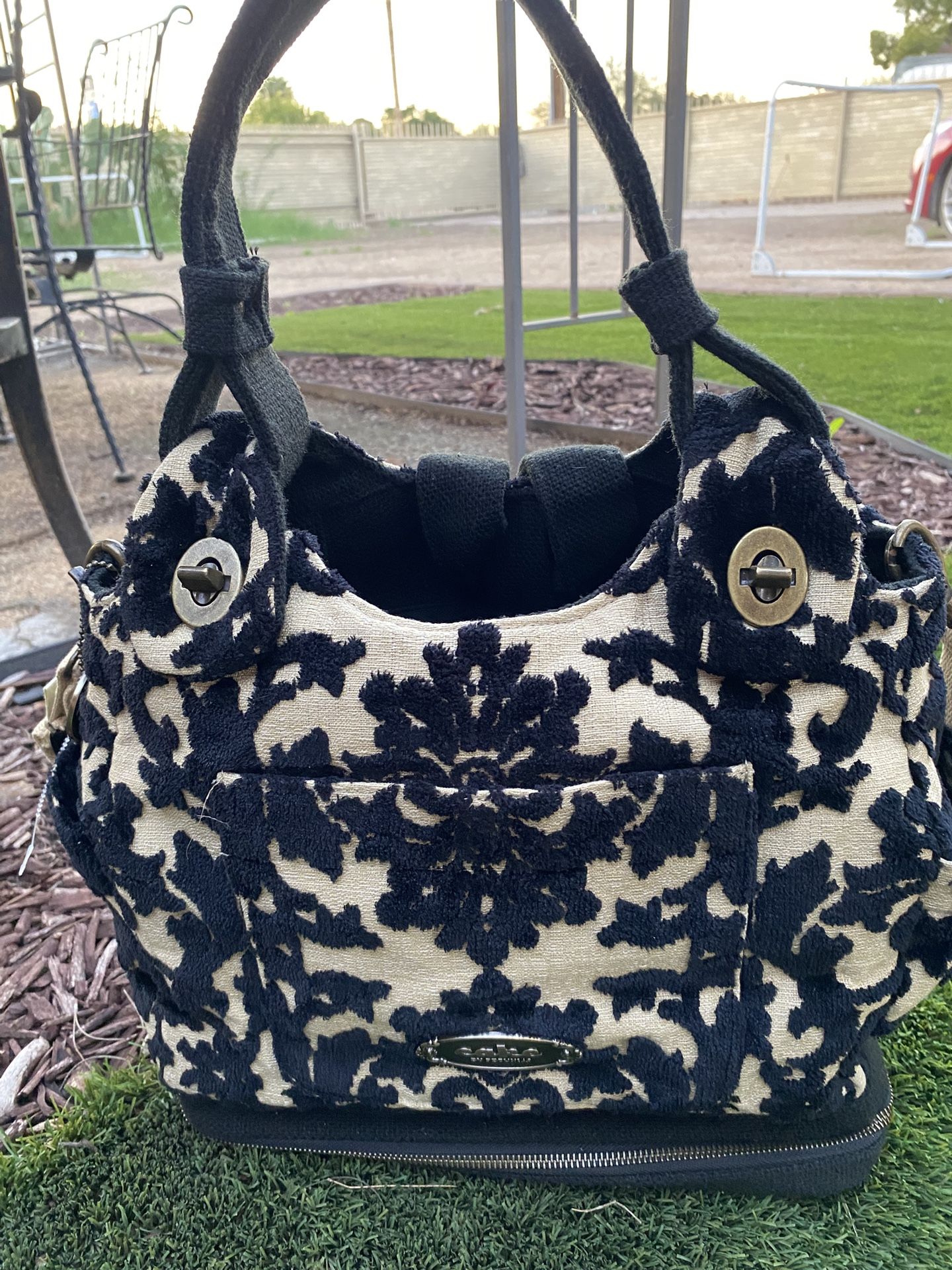 Cake Society by Petunia Pickle Bottom licorice Diaper Bag