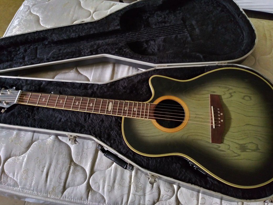 Older Ovation/ Applause with hard case.
