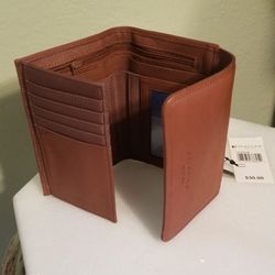 Reaction leather brand new. Free Coin Purse Included