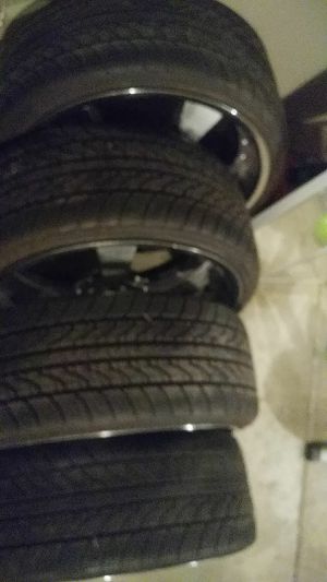 Photo 22in rims. tires are in great condition 500 or trade for other rims and tires