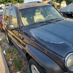 Two thousand and five jeep liberty let's bite the whole car for parts.Engine starts does not right well