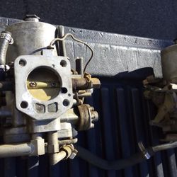 Vintage Hitachi SU carburetors for a Datsun 240Z.