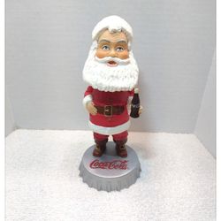 * Excellent Pre-Owned Condition *
** NO Chips or Cracks **
Coca-Cola / Carl's Jr. . . . .
Vintage (2002)
'Santa Claus' Bobblehead
* 7" tall x 3" diame