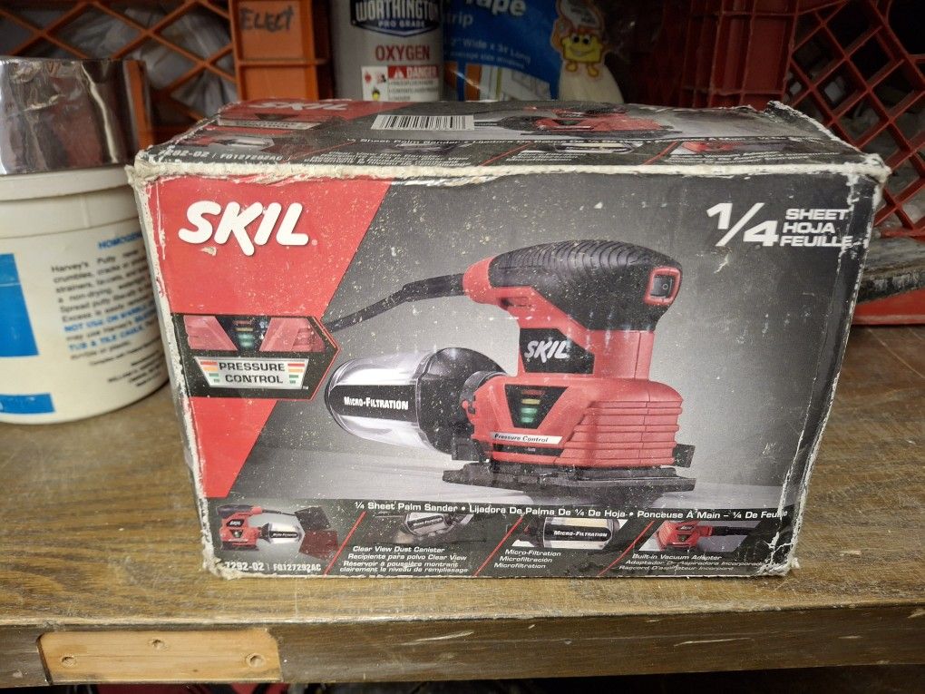 Palm Sander And Sandpaper