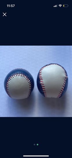 2 thunder baseballs (left one was caught during a game and right one is signed) Thumbnail
