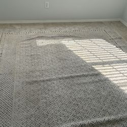 Beige Rug.. size 112 x 95