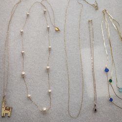 5 gold tone chains in excellent condition, all for one price.