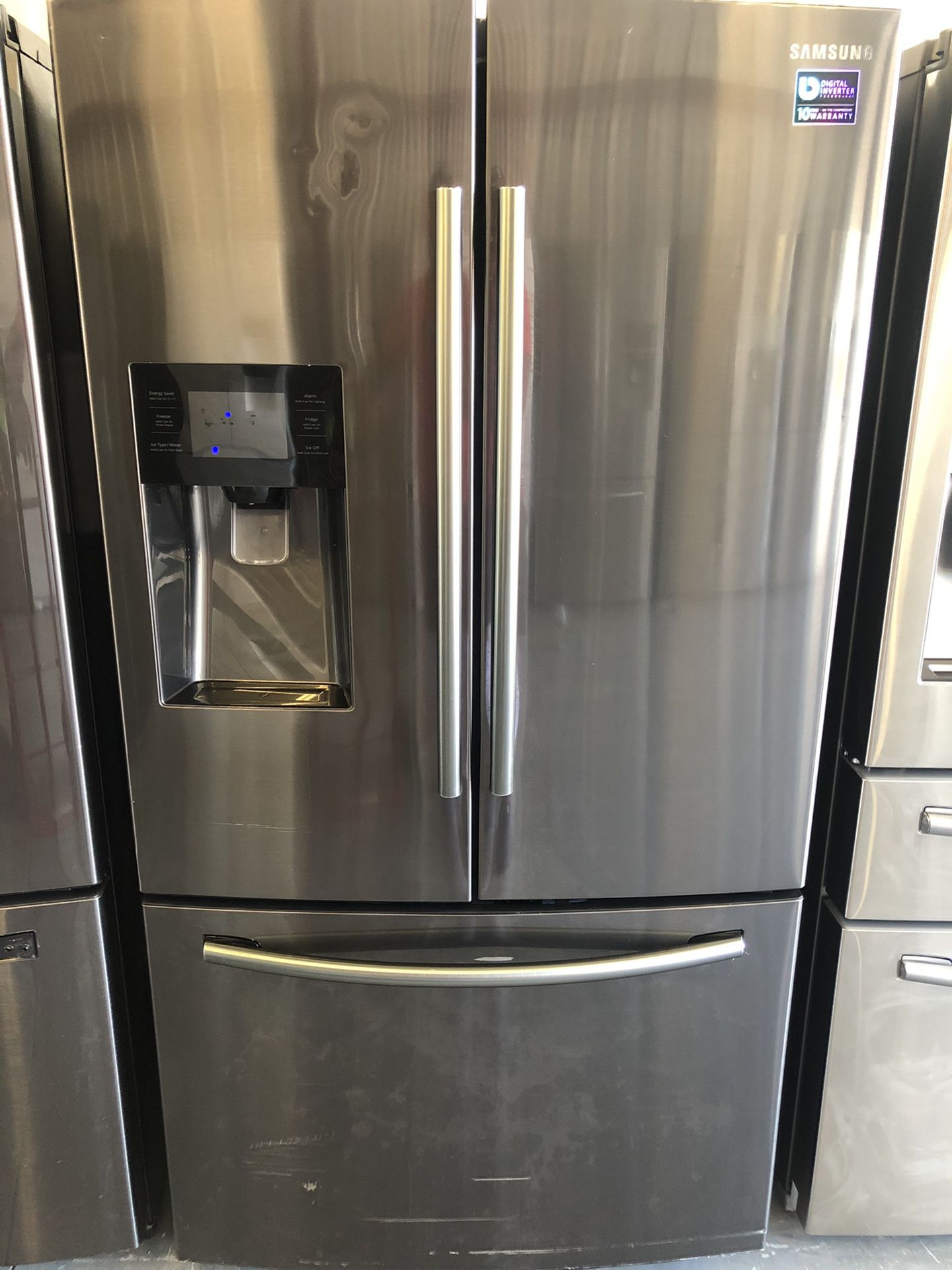 Black stainless Samsung refrigerator
