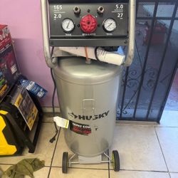Husky 27 Gal.165 PSI Vertical Electric Oil-Free Quiet Auto/Workshop Air Compressor with Dual Gauges and 2-Quick Couplers new missing wheel