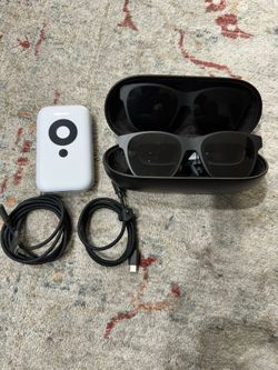 Xreal pro VR plus the xreal beam. The screen can go up “330 inch