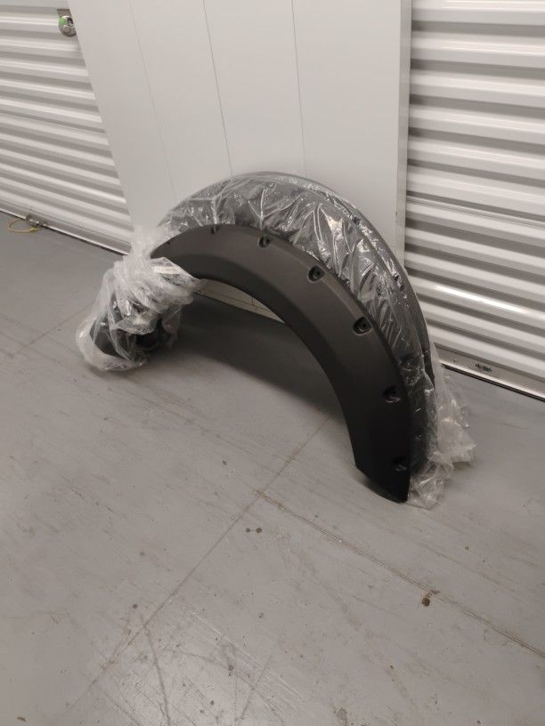Four Brand New Ford Fender Flare Covers