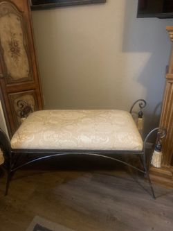 wrought iron cushioned bench