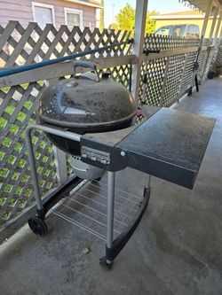 Weber Performer charcoal grill,  22-inch diameter.