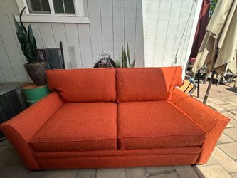 Orange loveseat
