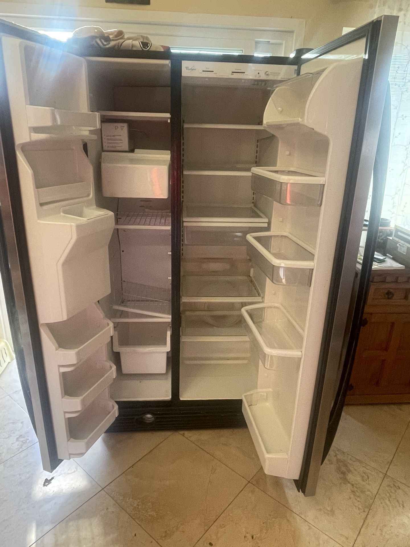 Refrigerator- Whirlpool. The Air Vent Between The Freezer And Refrigerator Was Getting Iced Up. I Think Because Rhe Left Door Was Not Closing properly