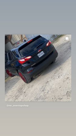 Custom painted rims, grills, emblems, calipers