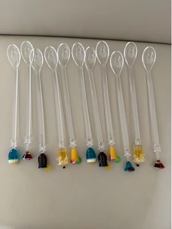 11 fun plastic cocktail stirrers. 12” long.