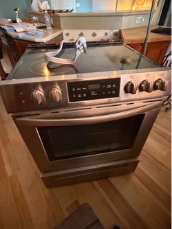 Electric Frigidaire Stove cracked top stainless steel