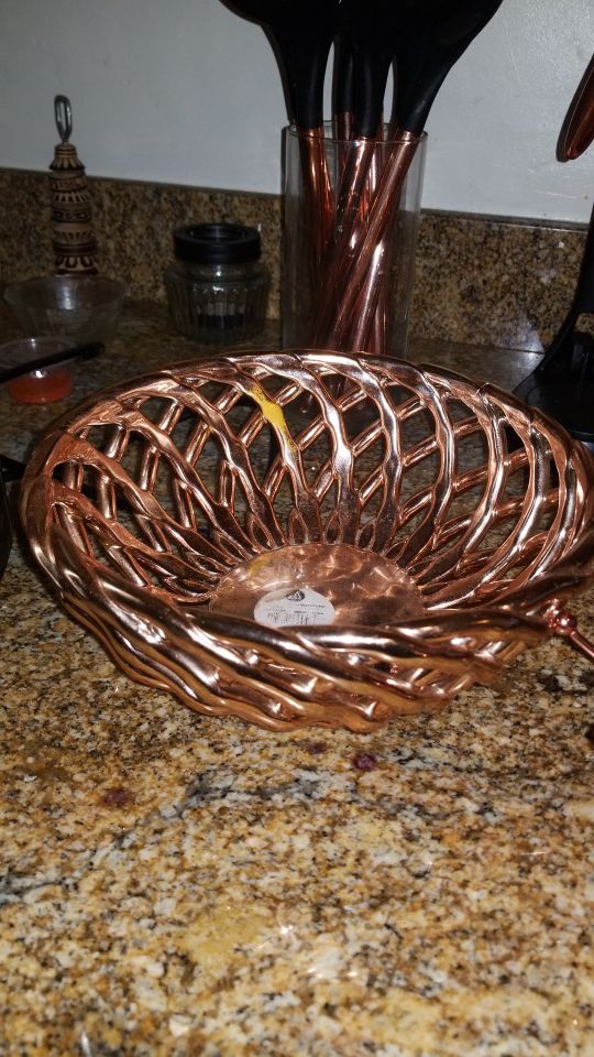 Copper fruit bowl and bread basket