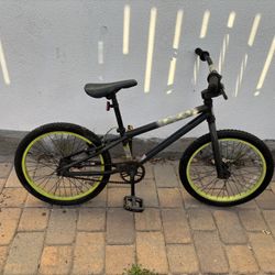 Green and black BMX bike