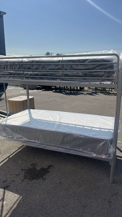 New twin over twin bunk bed with mattress and free delivery