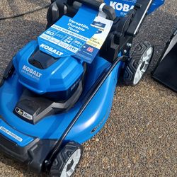 Brand new kobalt battery powered lawn mower with batteries and charger great deal