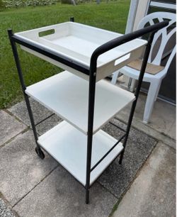 Last chance IKEA cart metal with plastic shelves, top tray, wheels on one side