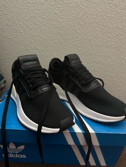 Adidas negros mujer