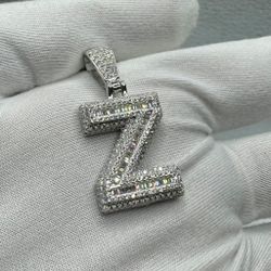 A Moissanite Initial in Sterling Silver with a CTW of 2.21 in Bugget Style