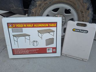 Camping table and solar panels