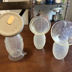 3 Haaka Silicone Breast Pumps• 1 Lid