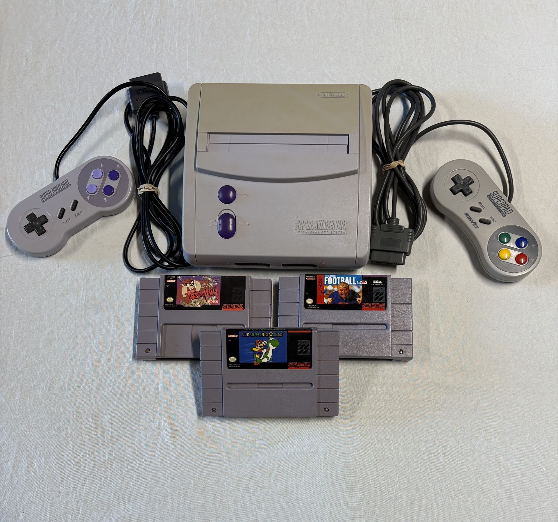 Super Nintendo w/ Super Mario World, Controllers + More!