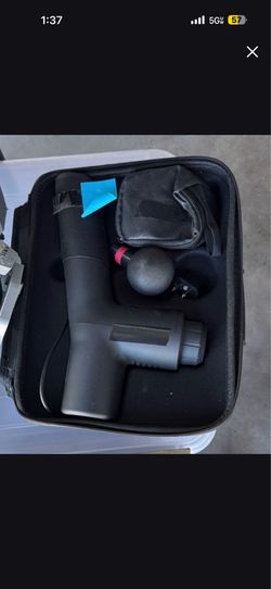 Massage gun with carrying case