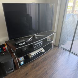 55" Samsung TV, Nintendo Switch, Bose Home Theater System, and TV Stand 