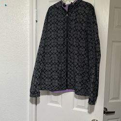 Woman’s Large Coach Raincoat 