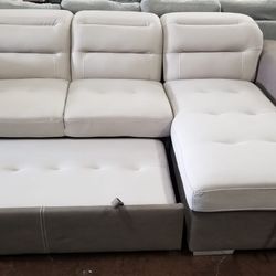 Highend two tone sofa chaise sectional with a pullout bed