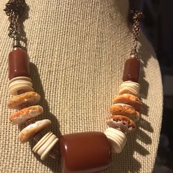 One of a kind necklace oyster shell bone and dark amber bead on copper