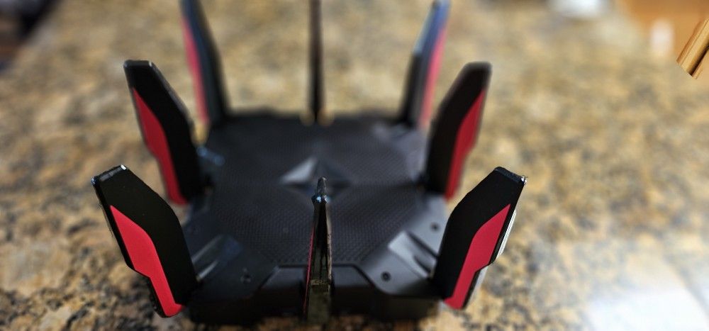 TP Link WiFi 6 Gaming Router AX11000 And Netgear Cable Modem