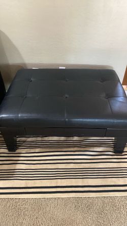 Leather black padded ottoman with storage drawer
