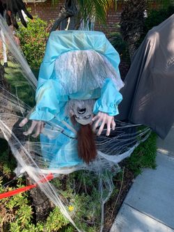 Halloween Animated Hunchback Witch 61 inches Preowned This one has been repaired to keep head up and her gown needs to be adjusted but she still loo