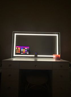 white vanity + LED mirror + chair