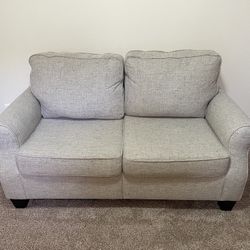 Tan Loveseat