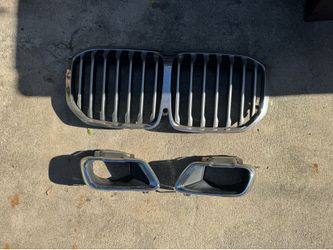 Genuine BMW X7 grille and exhaust tail pipe